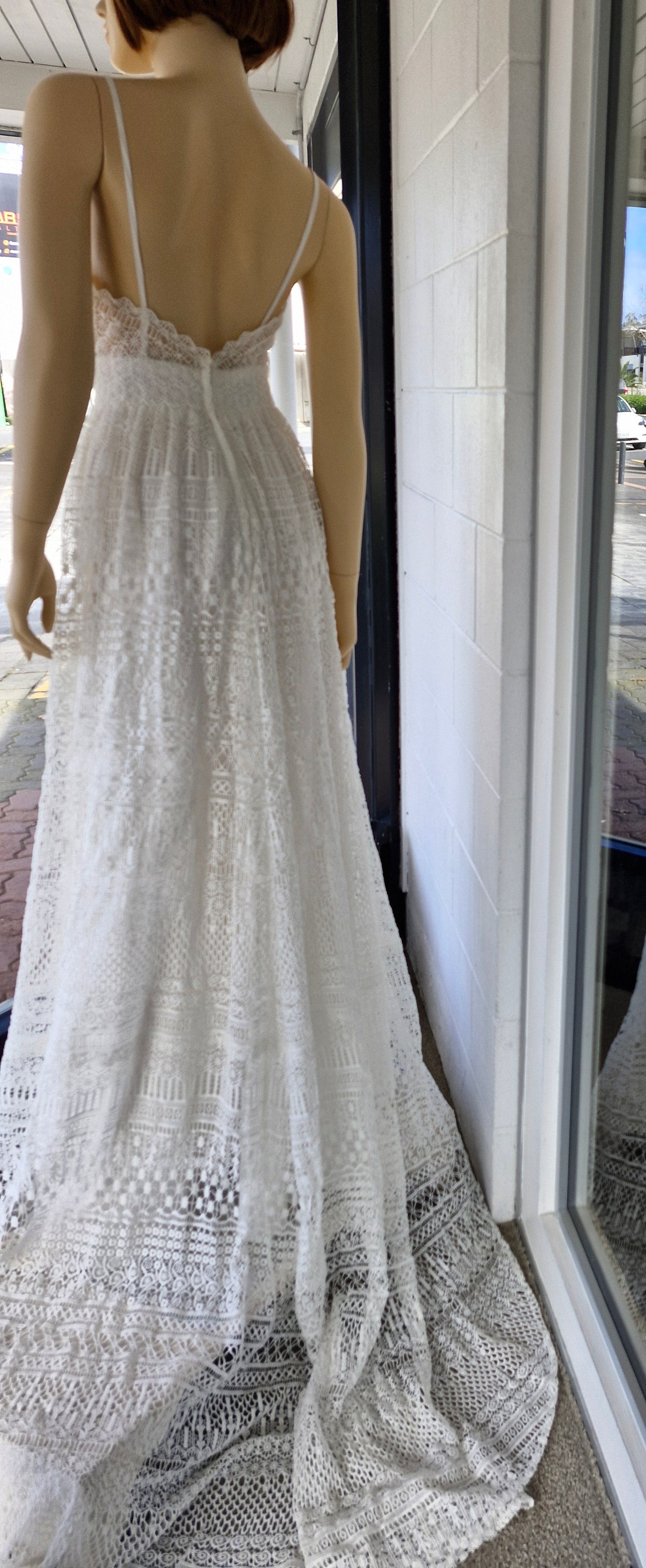 71795 Lace dress with spaghetti straps and soft A line skirt.