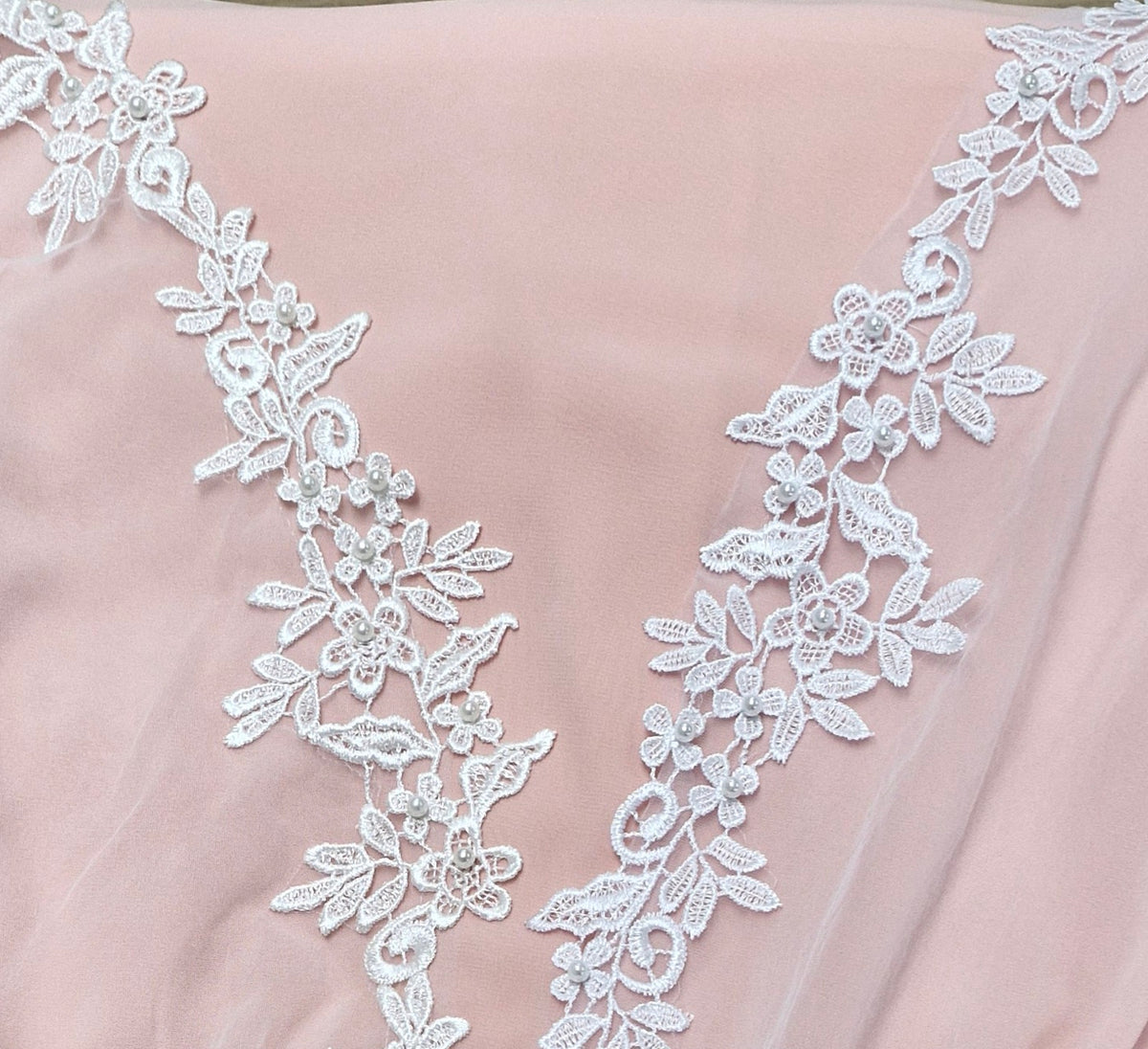 BBV150 single layer lace edge with pearl detail. 250cm long.