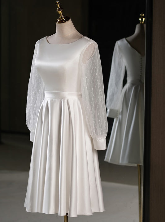 71861- Elegant, long sleeve midi wedding gown.
