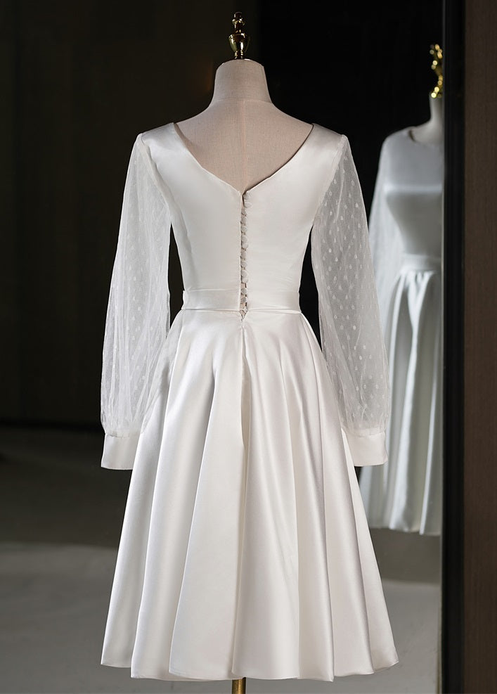 71861- Elegant, long sleeve midi wedding gown.