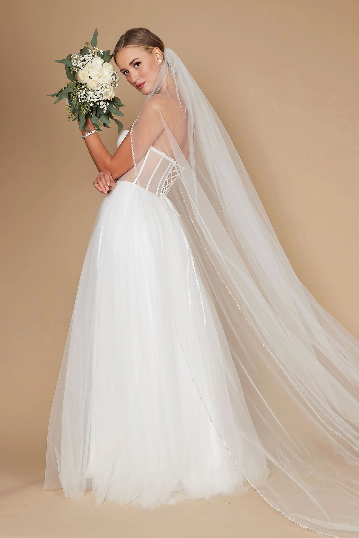 71893 Soft ivory tulle princess wedding gown. Corset bodice