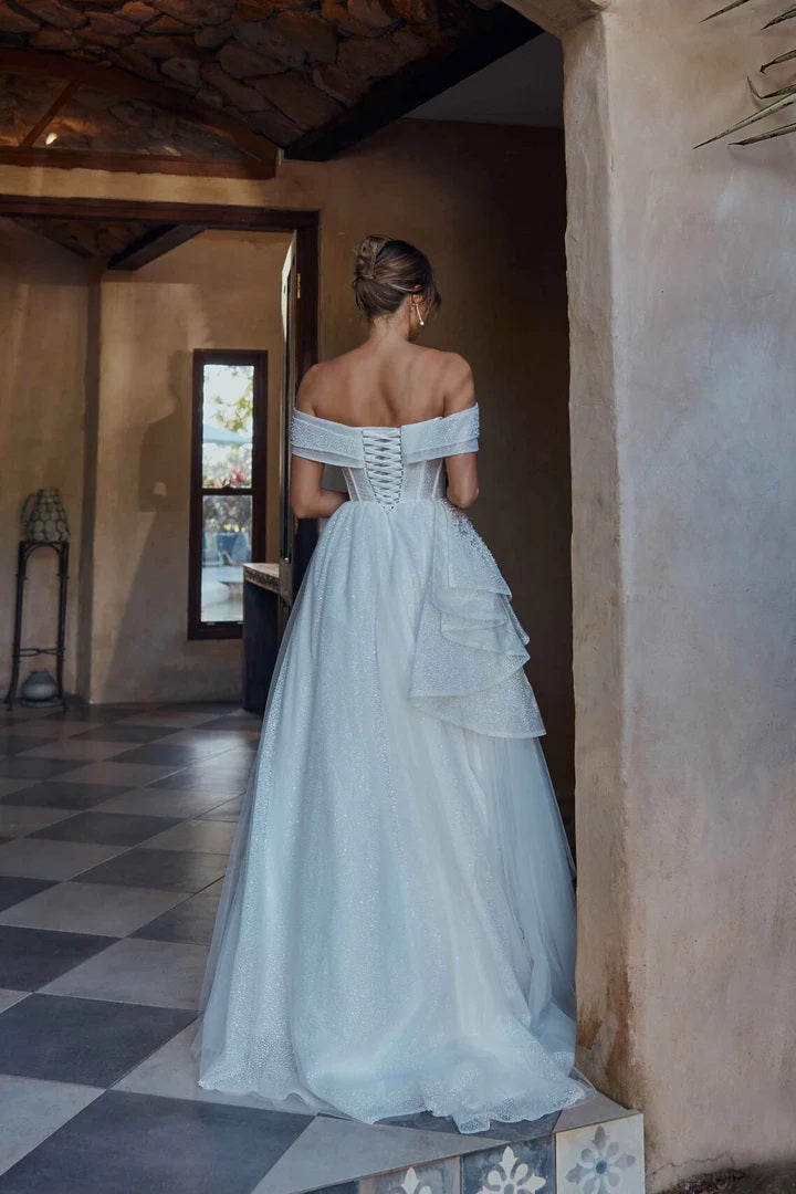 71940  Off shoulder princess with spectacular beadwork.