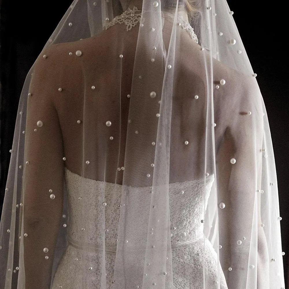 BBV70. 75cm long. Single layer pearl veil with comb. Stunning with satin gown.