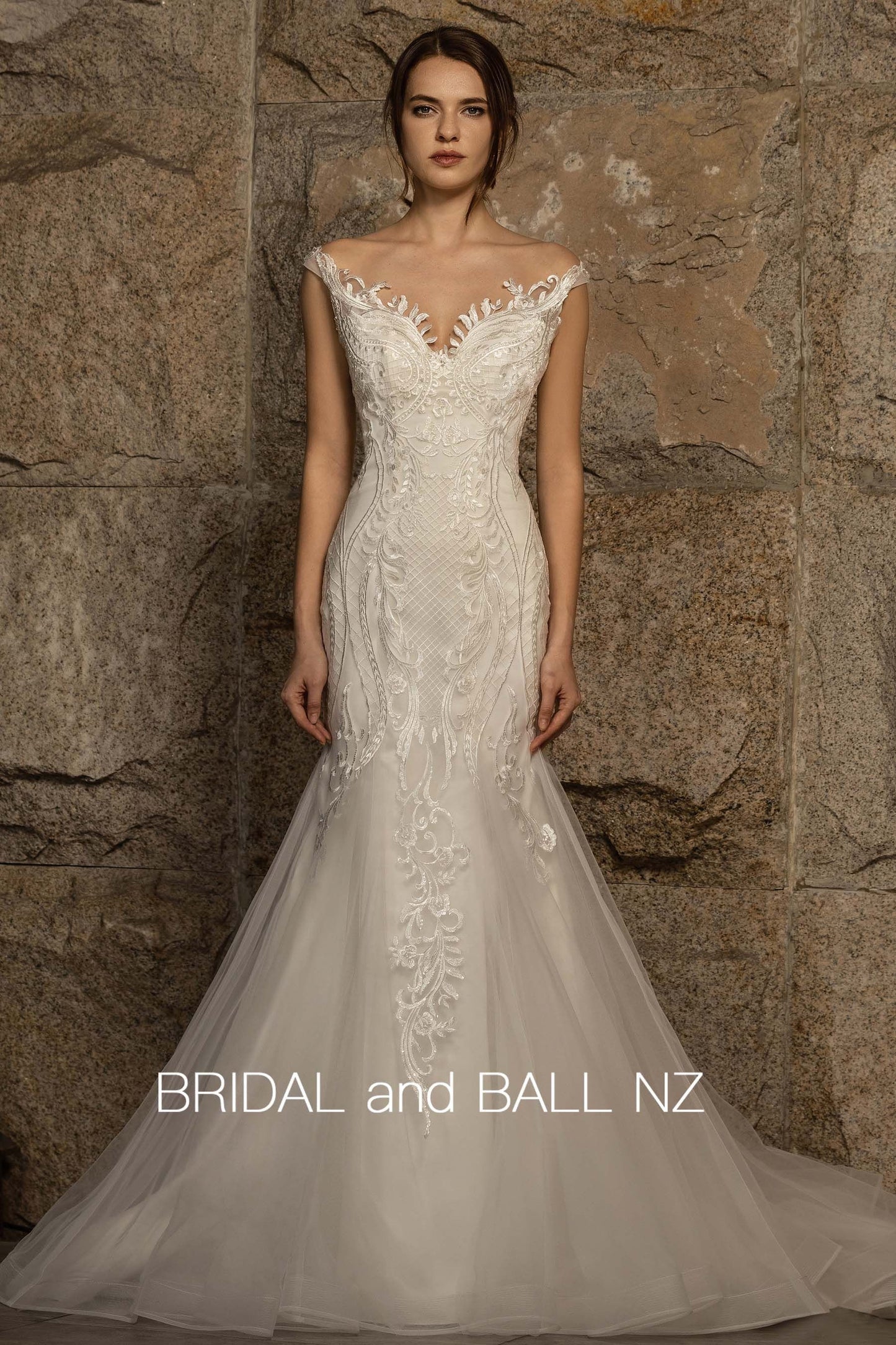 71363 Mermaid. Fully appliqued ivory wedding gown.