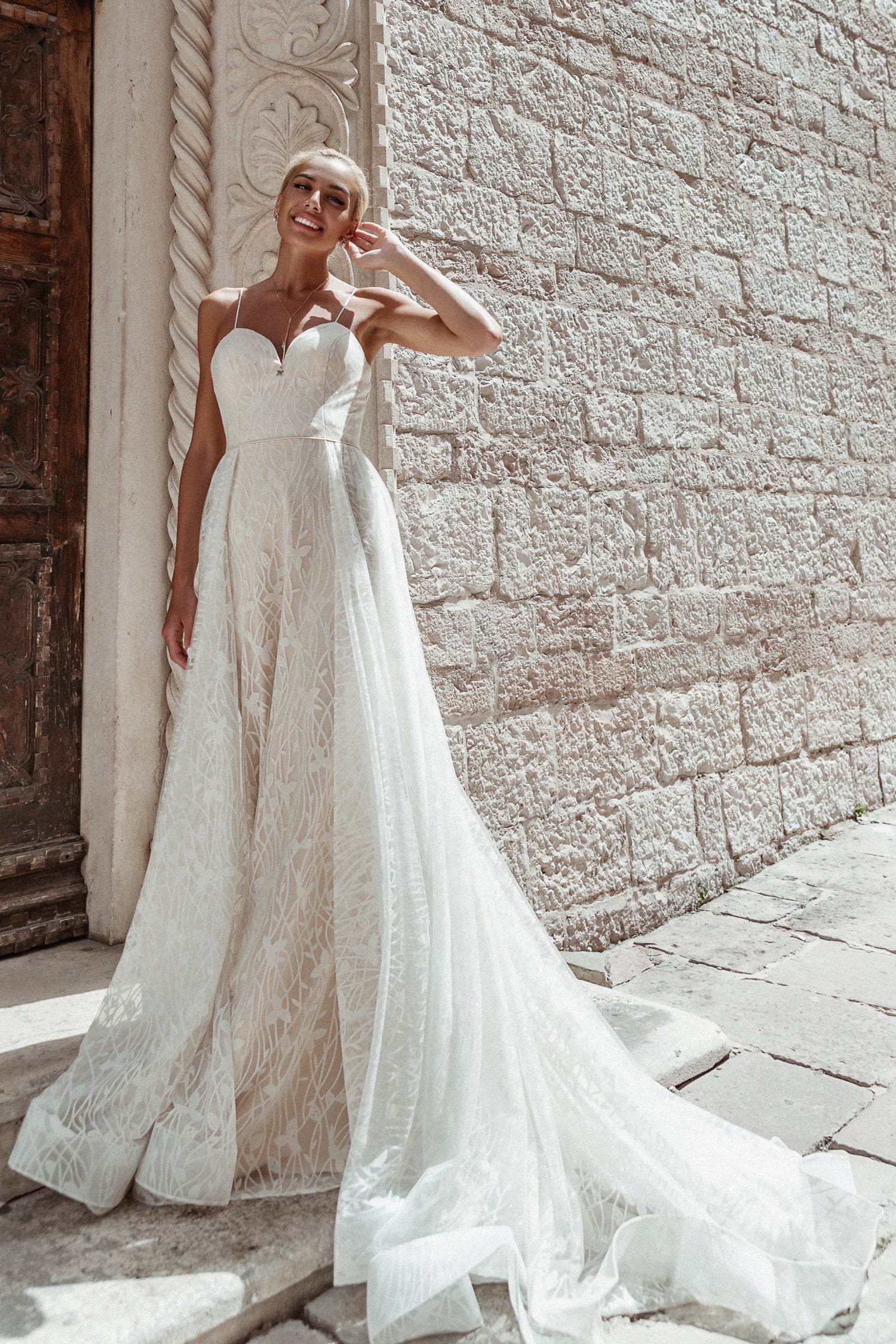 71430 Beautiful beaded fit and flare. Attached overskirt Bridal & Ball New Zealand 71430 Beautiful beaded fit and flare. Attached overskirt Bridal & Ball New Zealand