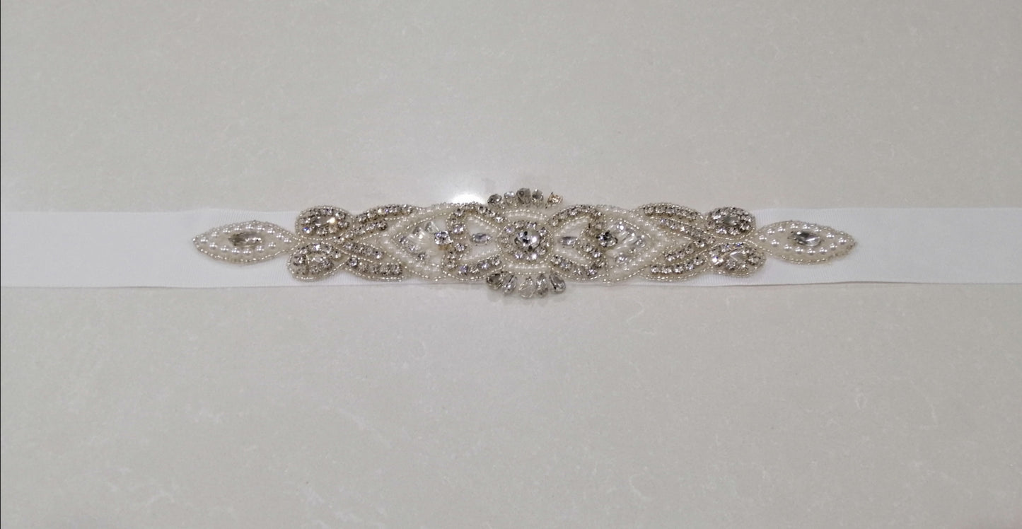 BBB1 Belt made of slightly off white semi textured ribbon with 28cm beaded detail