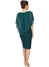 11171G Green stretch fabric with chiffon overtop. Size 8 and 16.