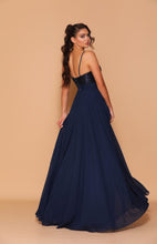 11241 Navy Blue. Elegant  A line with sequin bodice. Size 6 and 10
