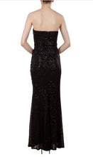 11252 Black soft sequin strapless fitted with split. size 14