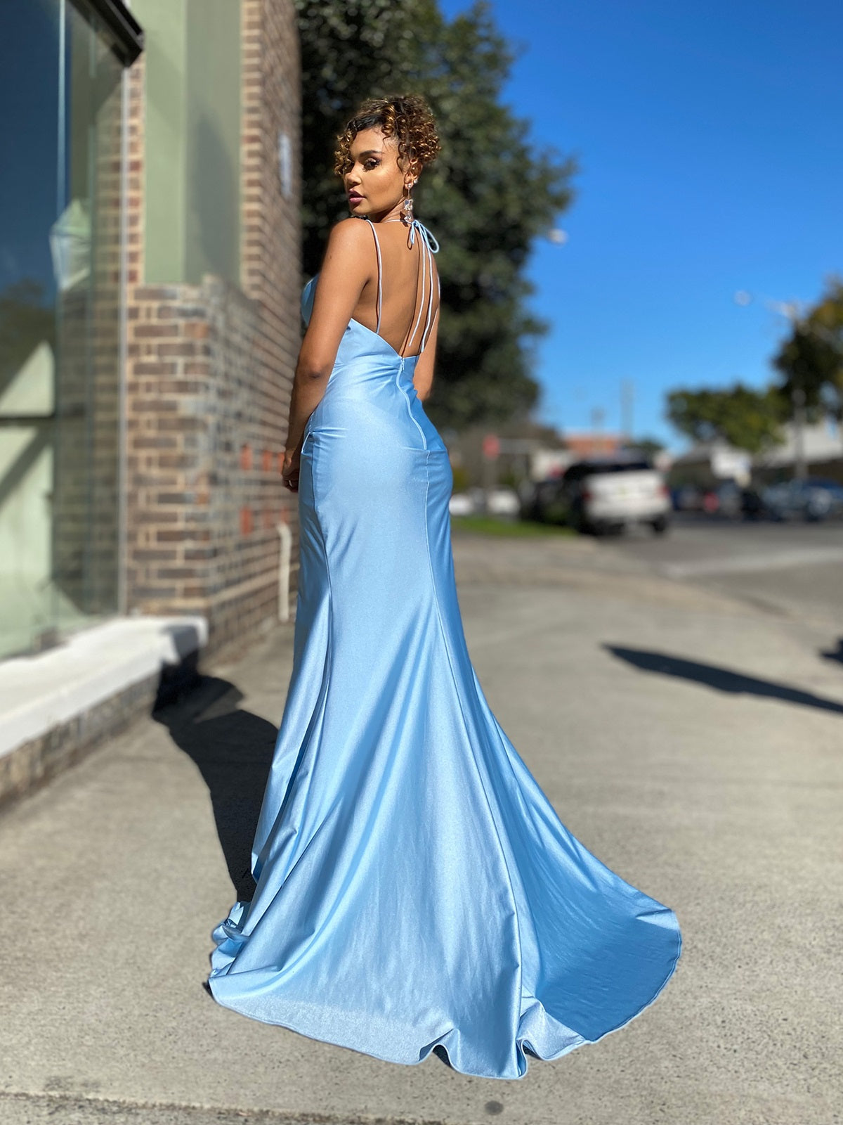 11325B  Powder blue Fitted. V neck. Open back. Split.