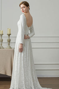 71338 Modest, lace, fit and flare wedding gown with long sleeves. Size 8