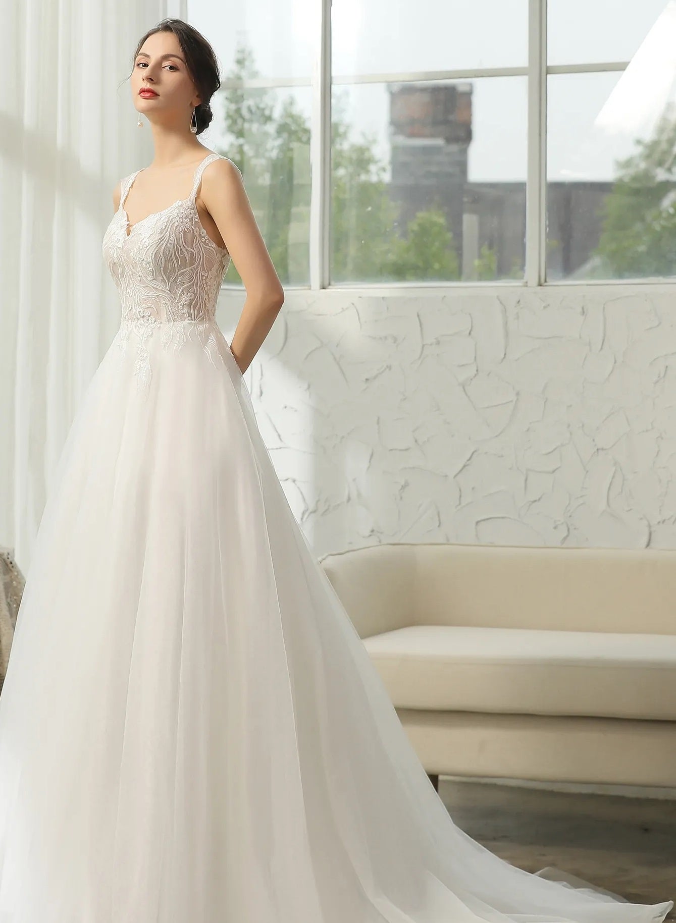 71547 Low sweetheart neckline. Embroidered bodice and straps