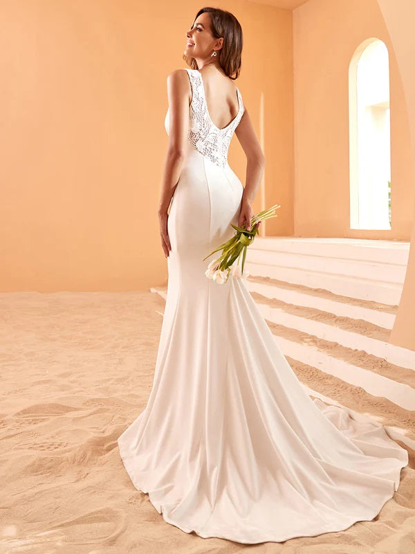 71717 Elegant, flattering, semi fitted. lace back detail.