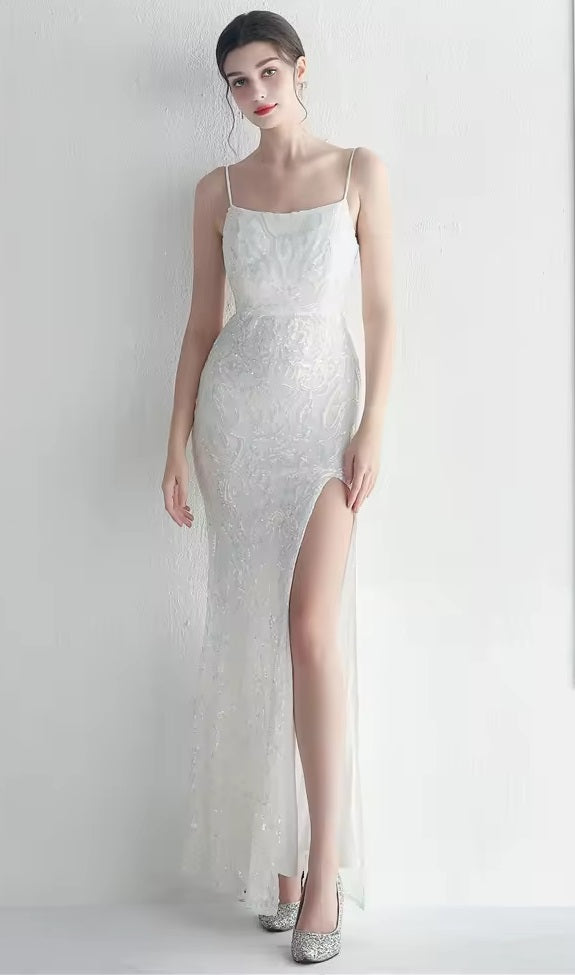 71725 Elegant, semi fitted. Ivory and mop sequin.