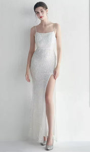 71725 Elegant, flattering, semi fitted. Ivory sequin size 14 and 18