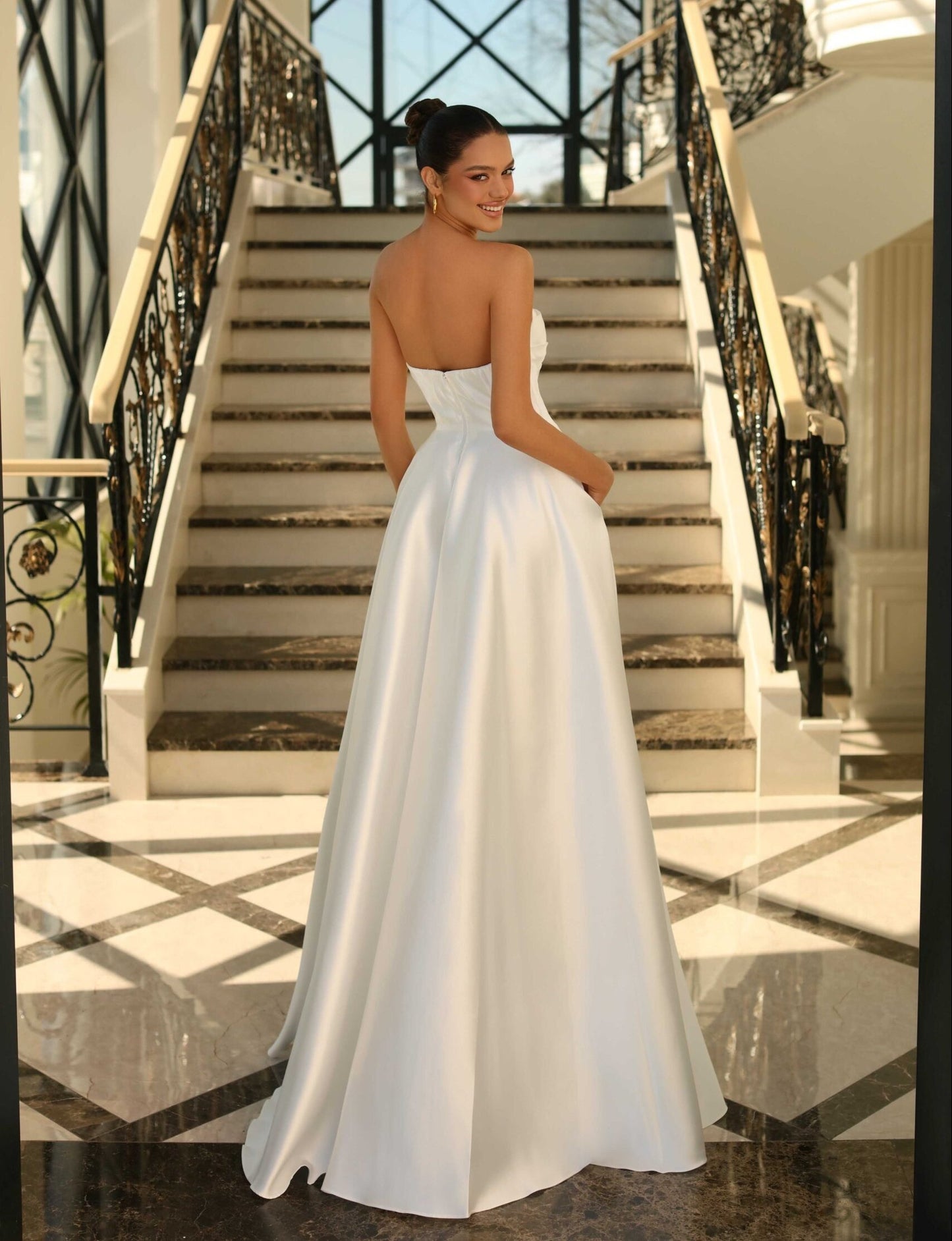 71830  Stunning strapless mikado satin wedding gown.