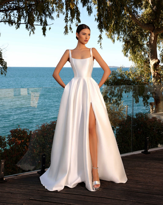 71845 / ARYA. Stunning boat neckline. Mikado satin gown.