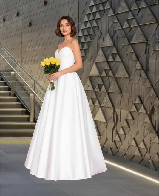 72010  Elegant strapless sweetheart neckline.