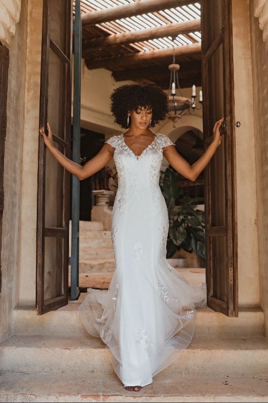 72015 V neck, beautifully detailed, semi fitted.