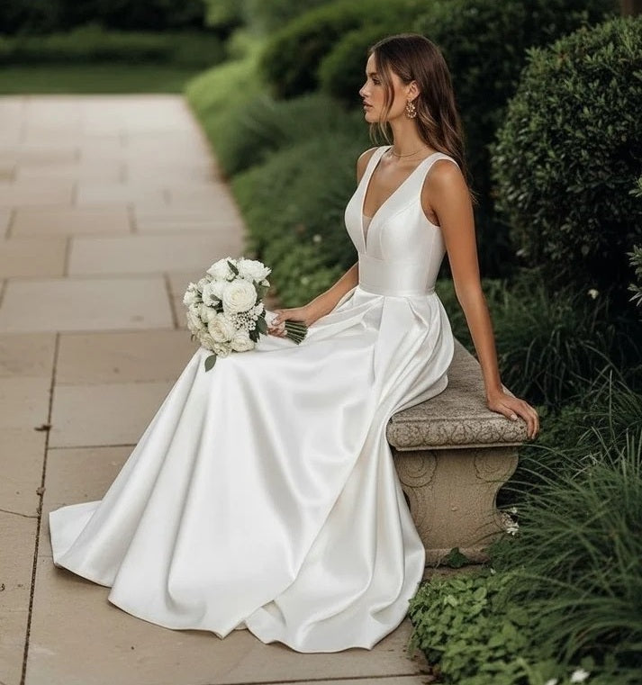 72022 Stunning V neckline. Mikado satin gown.