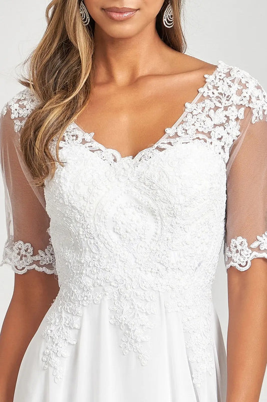 72052 Soft floaty chiffon with richly decorated bodice.