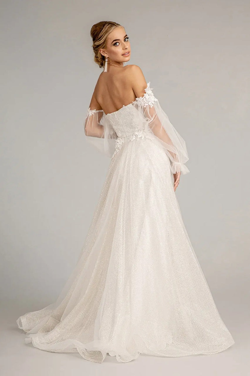 72053 A floral-embellished A-line gown. Detachable sleeves