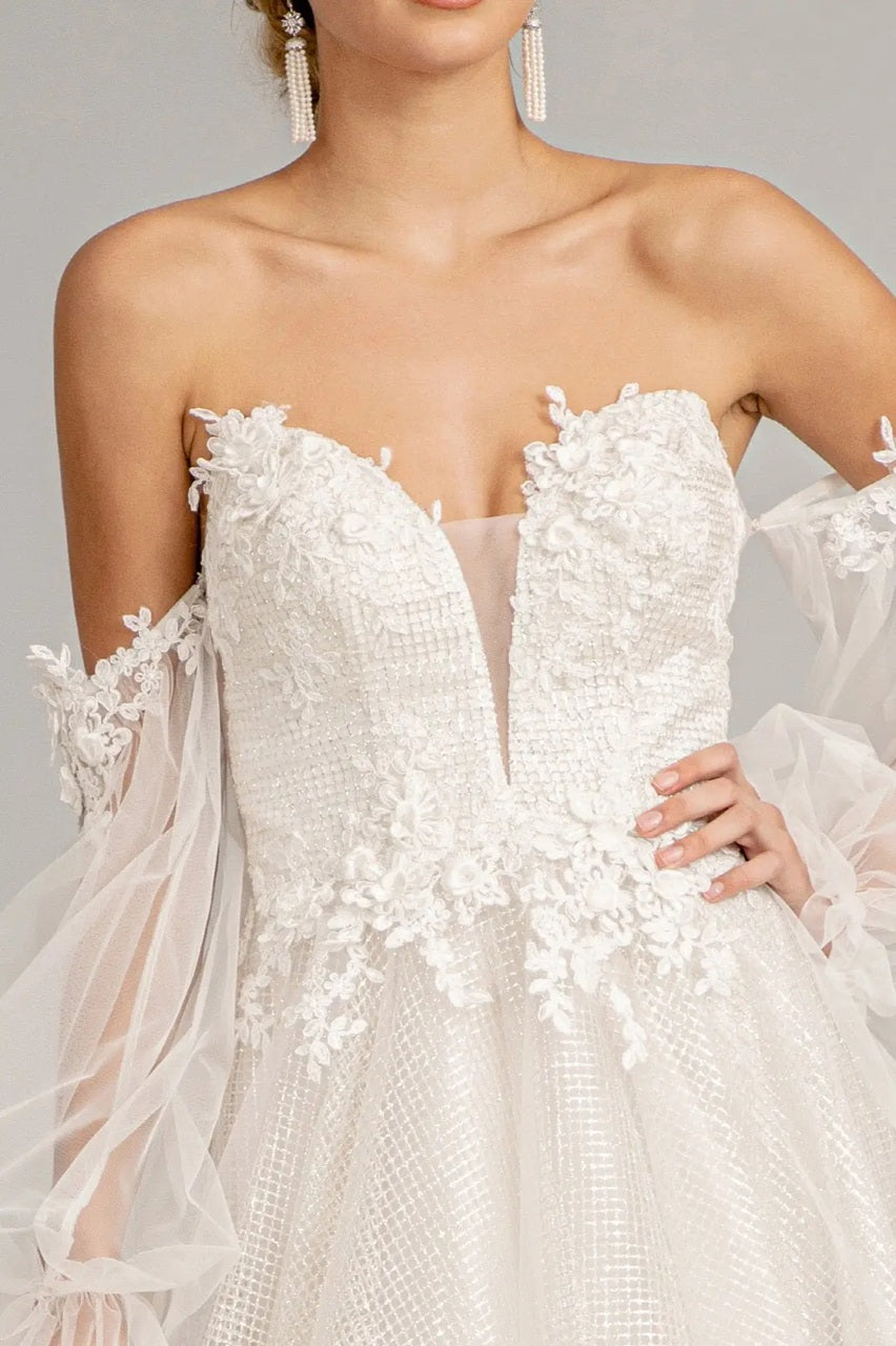 72053 A floral-embellished A-line gown. Detachable sleeves