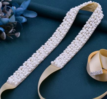 BBB10 Belt made of soft ivory satin ribbon with dense pearl detail.