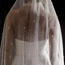 BBV60 2m long. Single layer pearl veil with comb. Stunning with satin gown