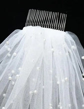 BBV60 2m long. Single layer pearl veil with comb. Stunning with satin gown.