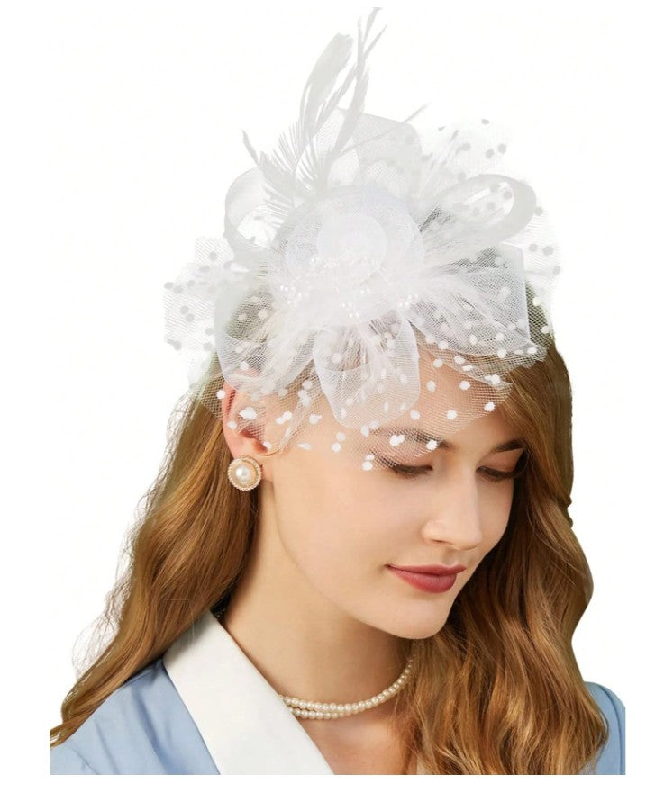 FAC1004W Classic, white fascinator with central flower, feathers and net.