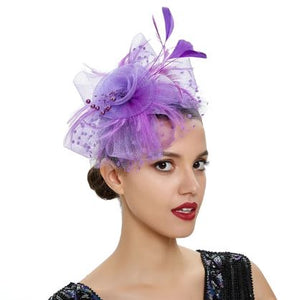 FAC1004 Classic, purple fascinator with central flower, feathers and net.