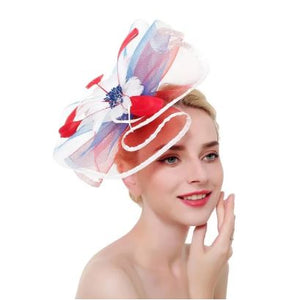 FAC1001 Classic, multi colour fascinator with the WOW factor.