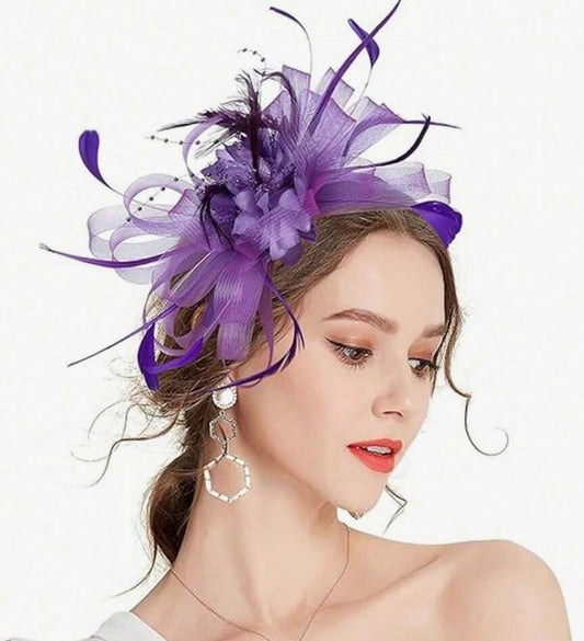 FAC10115P Classic, purple fascinator with central flower and feathers.