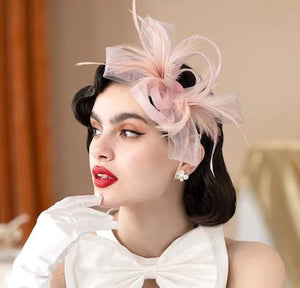 FAC901B  Classic, blush fascinator with beautiful feather detail.