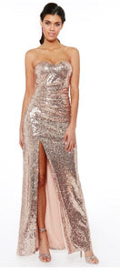 10428C Champagne, sequined, strapless semi fitting with slit. Size 12.