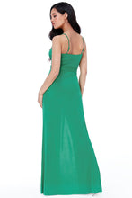10657 green wrap style spaghetti straps with split. Size 10 and size 14