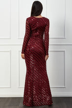 10907W Burgundy sequined striped long sleeved semi fitted.