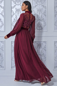 10955. Burgundy chiffon maxi. Long sleeves and sequin bodice. Size 10