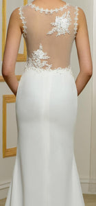 Style 1460. Size 10 fit and flare wedding gown with mesh back