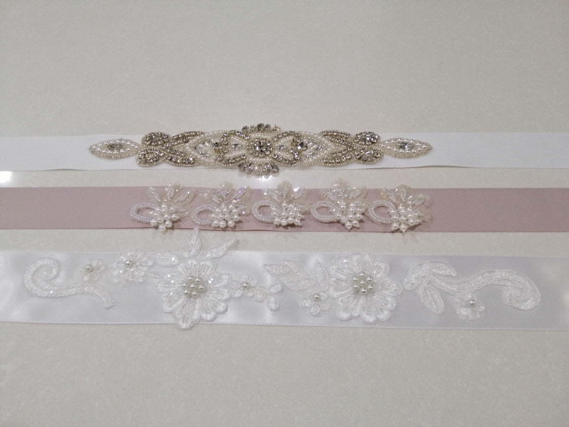 BBB3 Belt made of white satin ribbon with 33cm applique and pearl detail.