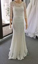 70055. Size 4 bohemian off white chiffon and lace gown with long sleeves