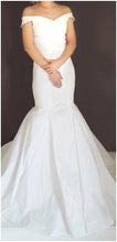 70095 Size 6 stretch tafetta off shoulder modern wedding dress.