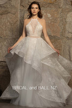 71362S Stunning firm lace overskirt with soft tulle front.
