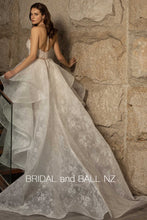71362S Stunning firm lace overskirt with soft tulle front.