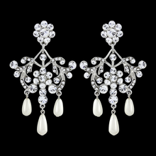 7406  Precious pearl earrings in a vintage inspired design.
