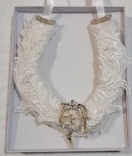 BBHS24 white satin bridal horseshoe with pearls and light ivory lace embellishments.