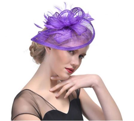 FAC500P  Classic, light purple fascinator with central feathers and net.