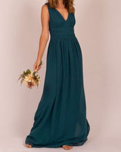BM2000 Teal. Maxi length v neck chiffon gown. Available to order. $159.00