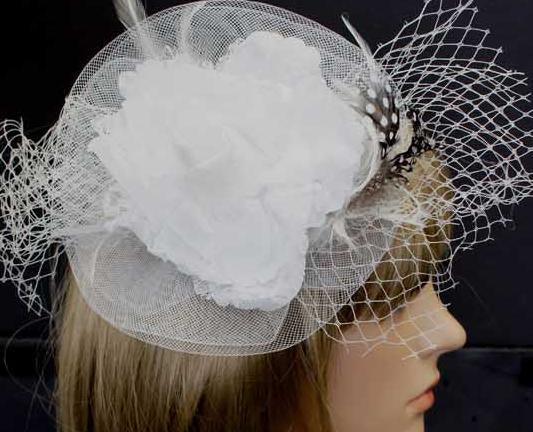 BBFAC2 Classic, elegant white fascinator with central flower, feathers and net.